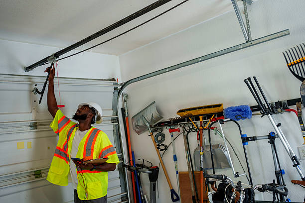 Professional Garage Door Roller Replacement technician working in Merion Station, PA